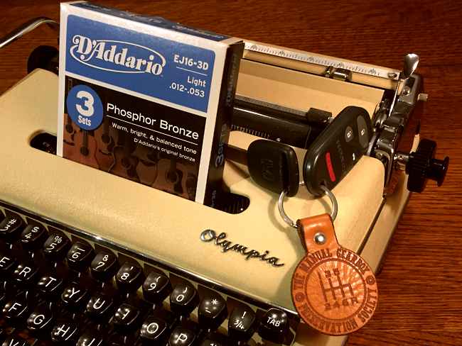 typewriter, guitar strings, car keys